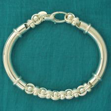 Sterling silver semi-bangle bracelet with handcrafted solid link chain.
