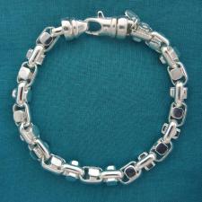 Men's silver bracelets. Rotating clasp designs.