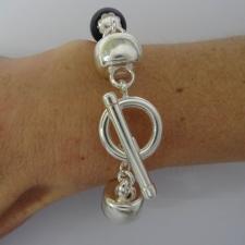 Sterling silver bracelet with black onyx & natural madrepore.