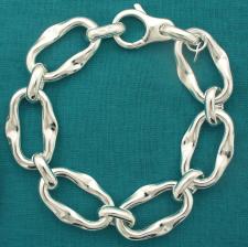 Sterling silver handmade bracelet. Asymmetrical link 17x27mm.