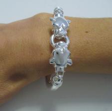 Sterling silver semi-bangle bracelet with double panther heads.
