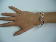 Handmade silver bracelet. Asymmetrical oval link.