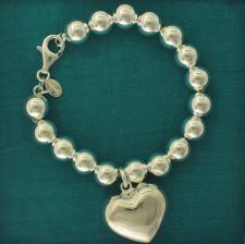 Sterling silver bead bracelet 10mm with heart charm.