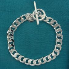 Sterling silver solid diamond cut curb bracelet 8.2mm x 3mm. Toggle bracelet.