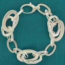 Sterling silver flat-textured oval link bracelet 20mm. Hollow chain.