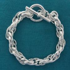 Sterling silver textured link bracelet 8,5mm. Toggle clasp.