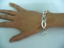 Handmade silver bracelet. Asymmetrical oval link.