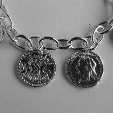 Coin charm bracelet in sterling silver