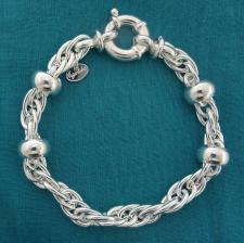 Bracciale vintage, catena maglia ovale doppia e barilotti in argento 925 massiccio. Larghezza 7,5mm.