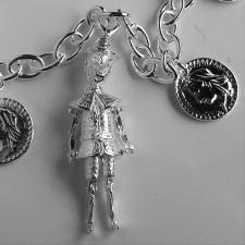 Sterling silver pinocchio charm.