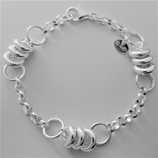 Bracciale in argento 925, rolo tondo e ''ciambelline''.