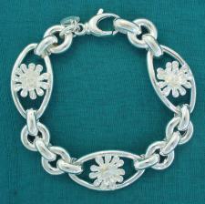 Sterling silver flower bracelet. Three flowers.