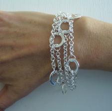 Sterling silver triple chain bracelet with round flat link. Solid chain.