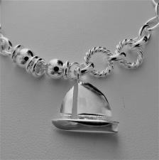 Braccialetto argento con ciondolo barca a vela