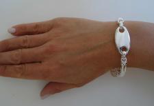 Silver bracelet with coin charms