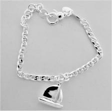 Silver bracelet with sailboat charm