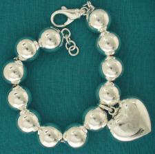 Sterling silver bead bracelet 14mm with heart charm.