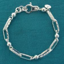 Bracciale in argento 925 massiccio, larghezza 6mm. Maglie rettangolari godronate e sfere.