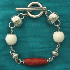Sterling silver bracelet with white agate & natural madrepore. T-bar closure.