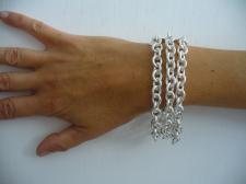 Bracciale in argento maglia ovale. Tre file.