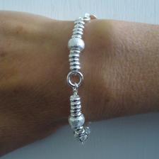 Sterling silver bracelet. Textured ''barilotto'' link 8mm.