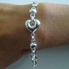 Bracciale con cuore centrale e catena maglia traversino. Argento 925.