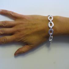 Sterling silver bracelet textured and polished oval link