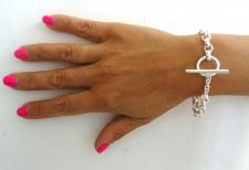 Bracciale a catena ovale e chiusura a barretta