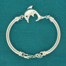 Sterling silver semi-bangle bracelet with dolphin.