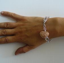 Sterling silver heart bracelet with rose gold plating charm