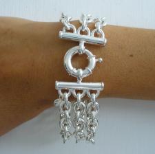 Bracciale in argento maglia ovale. Tre file.