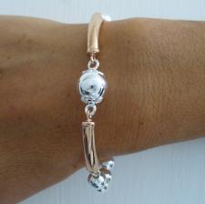 Sterling silver fancy bead bracelet, with 18 kt rose gold plating.