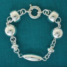 Sterling silver bracelet. Women's barilotto, ball, oval  & ''Ufo''  link chain.