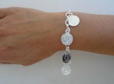Coin charm bracelet in sterling silver
