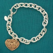 Bracciale in argento 925 con ciondolo cuore traforato. Cuore in argento con placcatura in oro rosa.