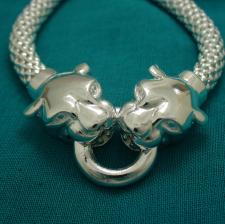 Sterling silver Pop Corn bracelet with double panther heads.