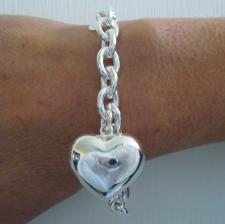 Sterling silver heart charm bracelet.