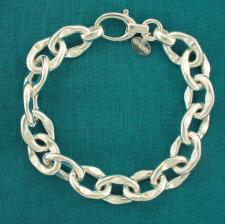 Handmade sterling silver bracelet. Asymmetrical oval link 12mm.