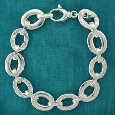 Handmade sterling silver bracelet. Textured and polished oval link 14mm.