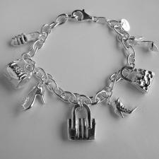 Silver bag and shoe charm bracelet.