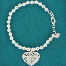 Sterling silver bead bracelet 6mm with heart charm.