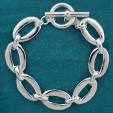 Solid sterling silver asymmetrical oval link bracelet 15mm, 45 grams. Toggle bracelet.