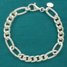 Sterling silver textured oval link bracelet. Curb link 8mm. Hollow link.