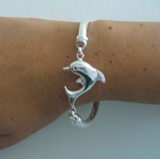 Sterling silver bangle bracelet with dolphin.