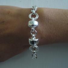 Sterling silver bracelet. ''Barilotto'' and diamond cut curb link chain.