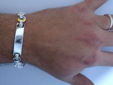 Bracciale argento 925 uomo con piastra e maglie tonde.