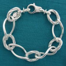 925 silver textured oval link bracelet. Made in Italy.