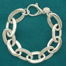 Sterling silver handmade bracelet. Asymmetrical oval link 15mm.