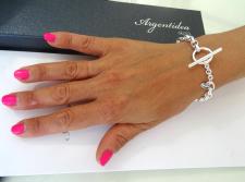 Bracciale a catena ovale e chiusura a barretta