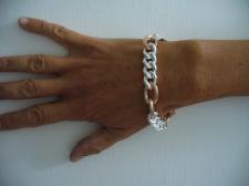 Sterling silver with 18 kt rose gold plating.